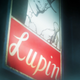 You know, that sign is too classy for a little back alley bar.